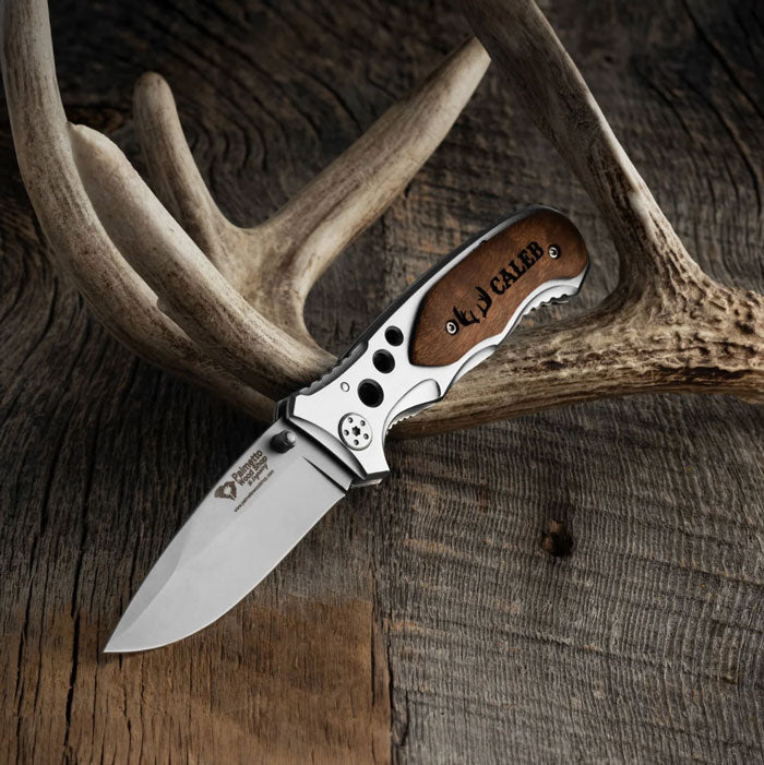 palmetto hunting knife sitting on a deer antler
