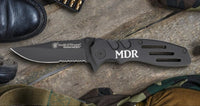 black engraved pocket knife
