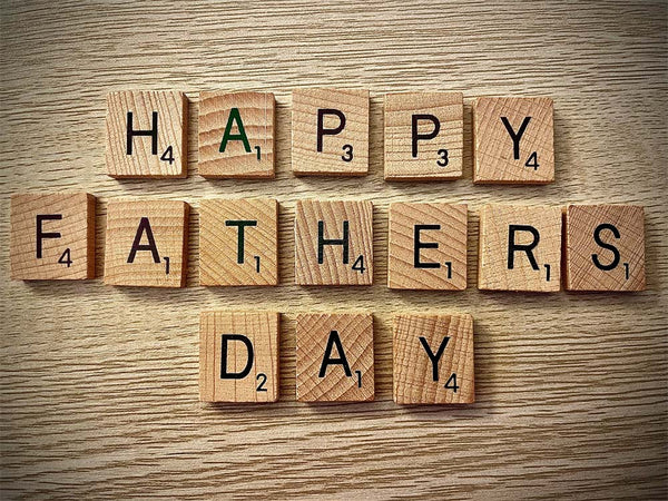father’s day spelled with engraved wood tiles