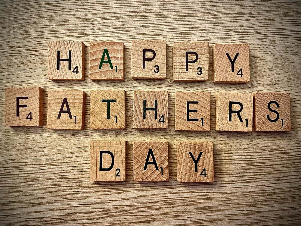 father’s day spelled with engraved wood tiles