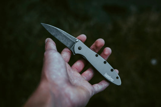 man holding a Kershaw knife